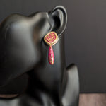 Handmade red and gold textured polymer clay earrings with cracked gold design