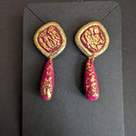 Handmade red and gold textured polymer clay earrings with cracked gold design