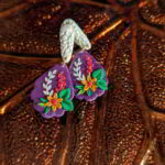 Handmade Floral Teardrop Earrings with textured white stud, purple base, and intricate flower details.